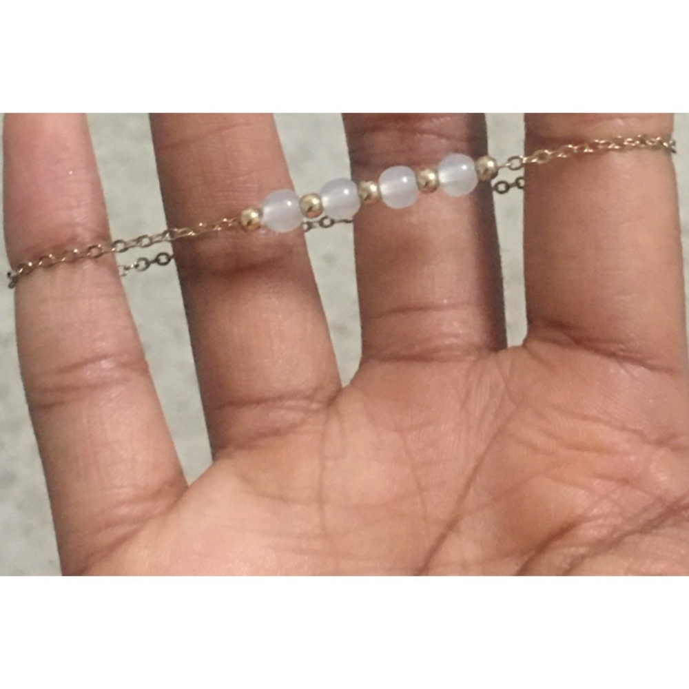 Elegant Gold and White Beaded Bracelet